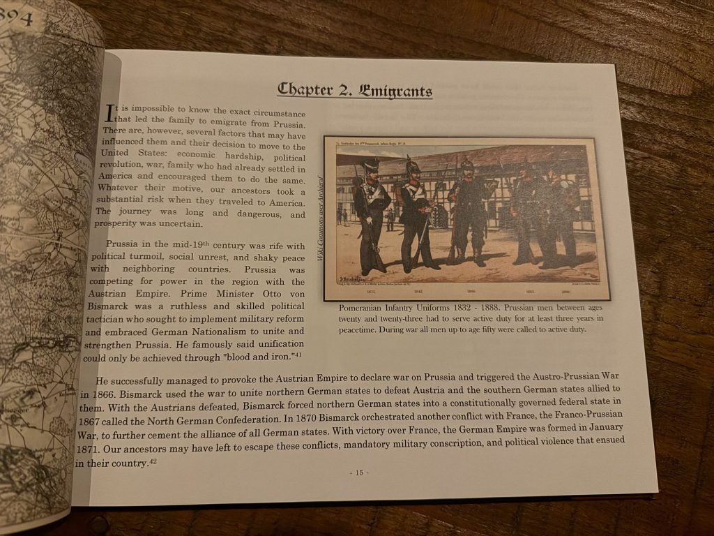 Page from a family history book titled 'Emigrants' detailing the circumstances leading to emigration from Prussia, accompanied by an illustration of Prussian infantry uniforms.