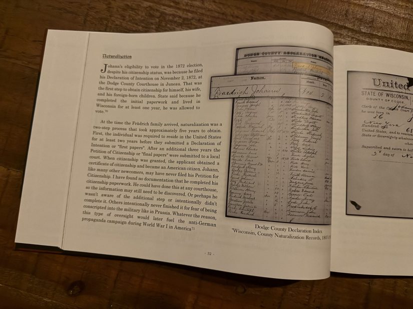 An open book page featuring text about naturalization procedures alongside historical documents related to citizenship.